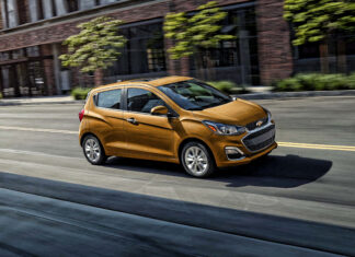 Chevrolet Spark In Motion On City Street Wallpaper