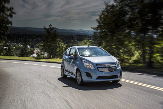 Chevrolet Spark In Motion On Scenic Drive Wallpaper