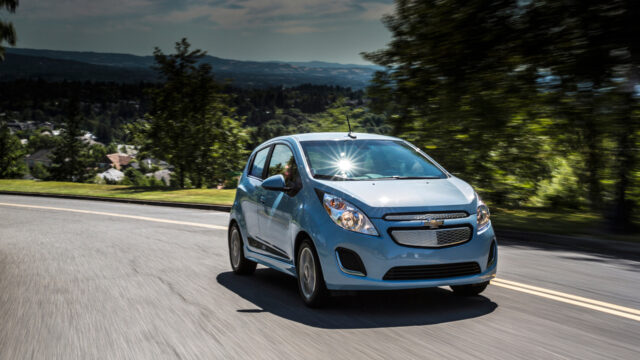 Chevrolet Spark On Scenic Drive For Vibrant Wallpapers