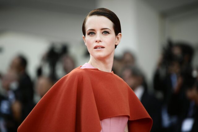 Claire Foy Elegant Red Cape Pose at Public Event Stunning Wallpapers