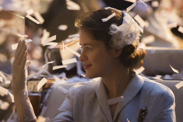 Claire Foy in Vintage Outfit with White Gloves and Floral Headpiece Wallpaper