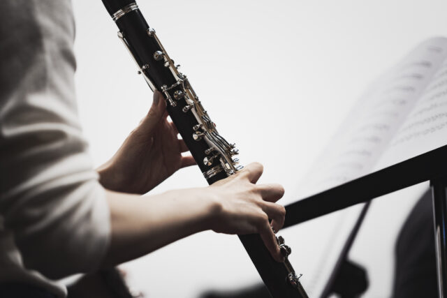Clarinet Player In Focus Perfect Wallpaper For Music Lovers