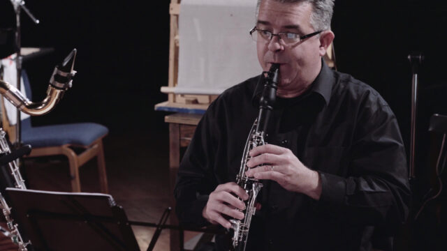 Clarinetist Performing On Stage Perfect For Wallpapers