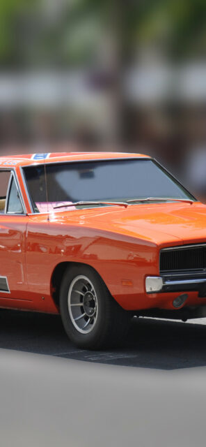 Classic Bright Orange General Lee Car on Street High Quality Wallpaper