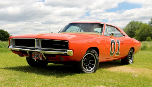 Classic General Lee Dodge Charger 01 Car in Bright Orange on Green Field Background