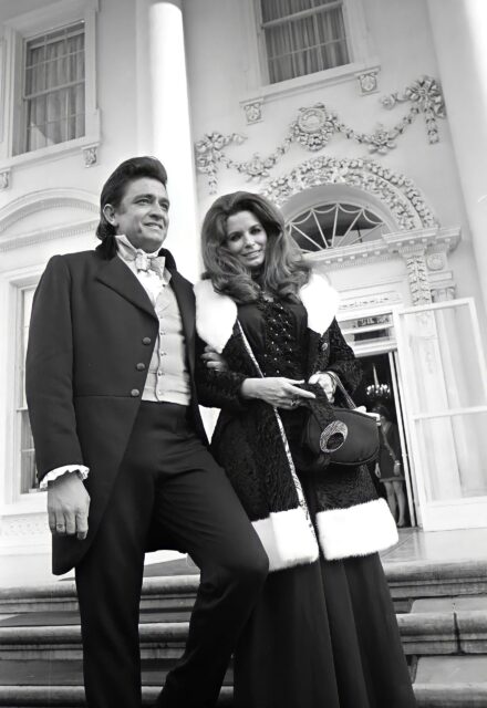 Classic Johnny Cash Portrait In Elegant Attire Wallpaper