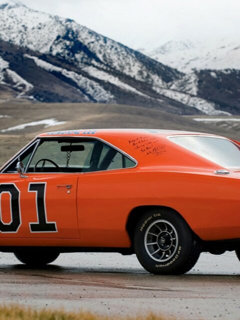 Classic Orange General Lee Car Wallpaper with Mountain Background and Number 01 Design