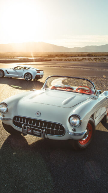 Classic And Modern Chevrolet Corvette On Scenic Road Chevrolet Corvette Wallpapers