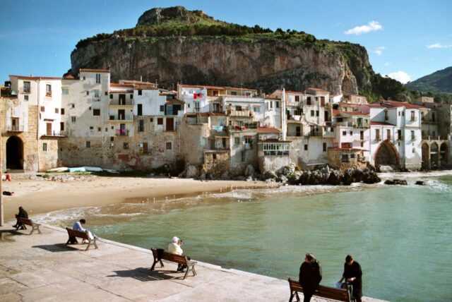 Coastal Charm Of Cefalù Italy Scenic Wallpaper