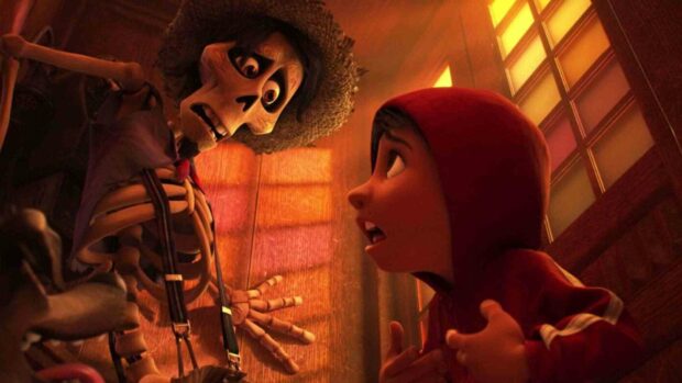 A boy in a red hoodie talks to a skeleton figure wearing a straw hat in a warmly lit room, HD Desktop Wallpaper