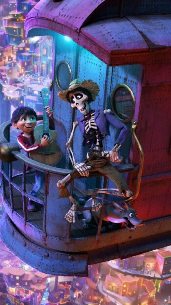 A boy plays guitar while a skeleton dances on a moving train in the Coco cartoon wallpapers, 2K Mobile Wallpaper