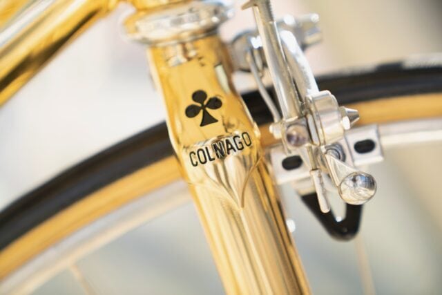 Colnago Bicycle Frame Close Up with Gold Finish for Premium Wallpapers