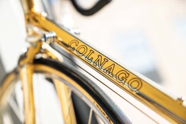 Colnago Gold Bicycle Close Up Elegant Cycling Frame Colnago Wallpapers