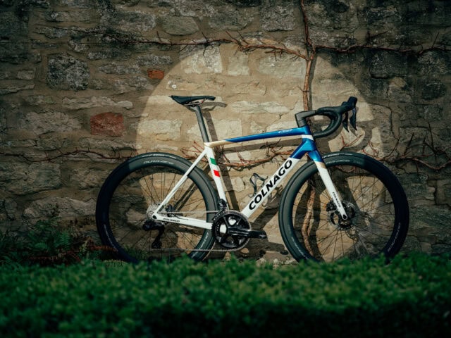 Colnago Road Bike Against Stone Wall Colnago Wallpapers High Performance Cycling