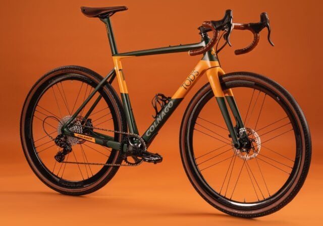 Colnago TODS Cycling Bike on Orange Background High Quality Wallpaper