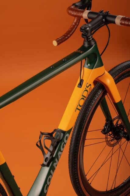 Colnago Tods G3X Gravel Bike with Orange and Green Frame on Orange Background