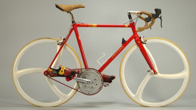 Colnago Vintage Red Concept Bicycle with White Tri Spoke Wheels Wallpaper