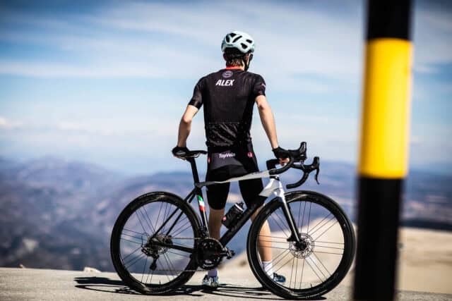 Colnago Wallpapers Cyclist Standing with Bicycle Overlooking Mountain View
