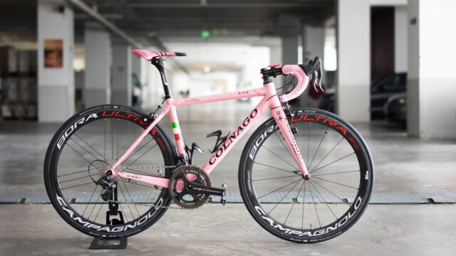 Colnago Wallpapers Pink Road Bike with Campagnolo Bora Ultra Wheels in Garage Setting