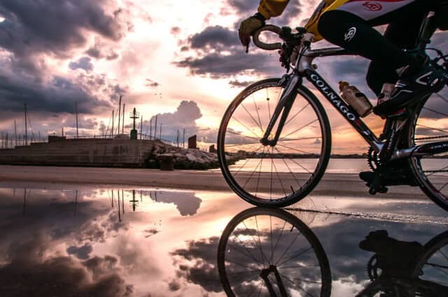 Colnago Wallpapers Scenic Sunset Ride Reflecting on Water by the Sea