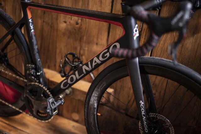 Colnago road bike closeup with wooden background high quality wallpapers