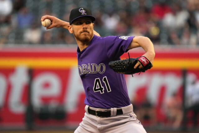 Colorado Rockies Pitcher In Action Wearing Purple Jersey MLB Game Wallpaper