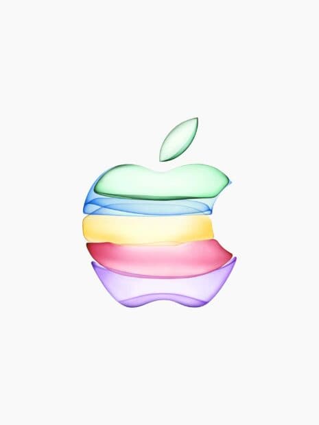 The image shows a colorful translucent Imac logo with green, blue, yellow, red, and purple shades on a white background, 2K Mobile Wallpaper