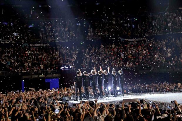 A live concert stage with performers and an enthusiastic crowd enjoying the concert, HD Desktop Wallpaper
