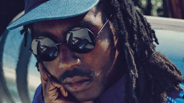 Cool Dev Hynes Wallpaper With Sunglasses And Cap