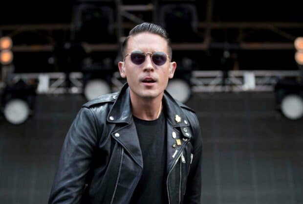 A close up of G Eazy wearing sunglasses and a leather jacket during a live performance, 2K Desktop Wallpaper