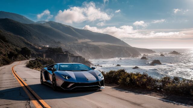 Cool Lamborghini Desktop Wallpaper, A Stunning Cool Lamborghini Driving Along A Coastal Highway With Ocean Views