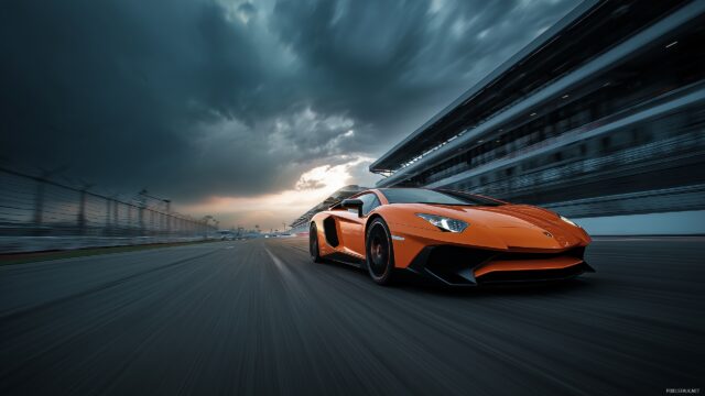 Cool Lamborghini Desktop Wallpaper Free Download, A Cool Lamborghini Racing On A Track With Motion Blur Emphasizing Speed
