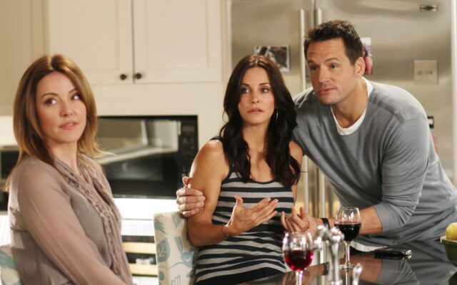 Cougar Town TV Series Cast Having A Conversation At Kitchen Table