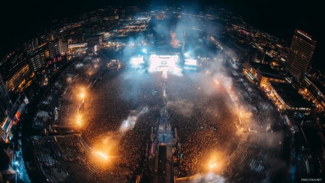DJ Wallpaper For Desktop Computer, An Aerial View Of A DJ Performance At A Massive Outdoor Concert Under Bright Lights