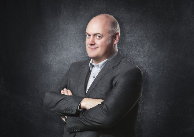 Dara O Briain Portrait Wallpaper Suit And Confident Pose