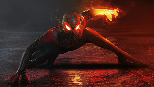 Dark Spider Man Striking Pose With Fiery Glove Wallpaper