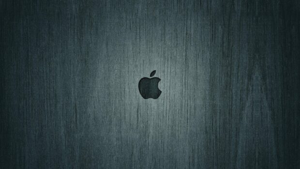 The Imac logo is centered on a dark textured surface, 4K Desktop Wallpaper