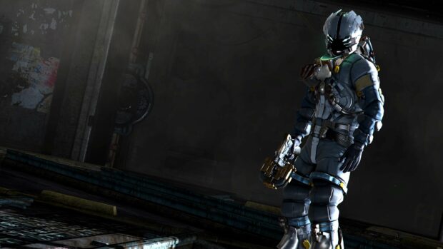 A character from Dead Space stands in a dark industrial setting holding a futuristic weapon, 4K Desktop Wallpaper