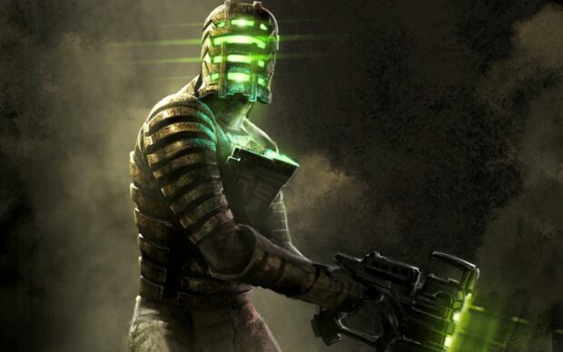 A Dead Space character holds a futuristic weapon glowing green in a dark setting, 2K Desktop Wallpaper