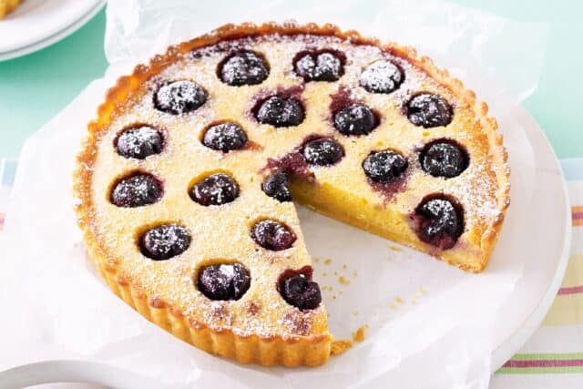 Delicious Cherry Tart with Powdered Sugar Perfect Tart Wallpapers Background