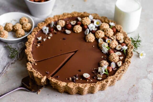 Delicious Chocolate Tart with Hazelnut Crust and Decorative Toppings for Tart Wallpapers