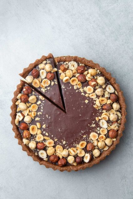 Delicious Chocolate Tart with Hazelnuts Perfect for Tart Wallpapers Backgrounds