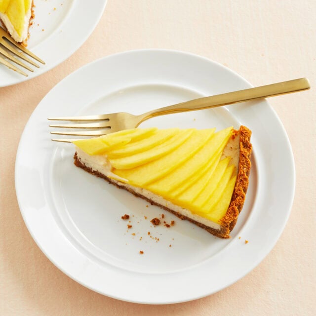 Delicious Pineapple Tart on White Plate with Gold Fork Tart Wallpapers