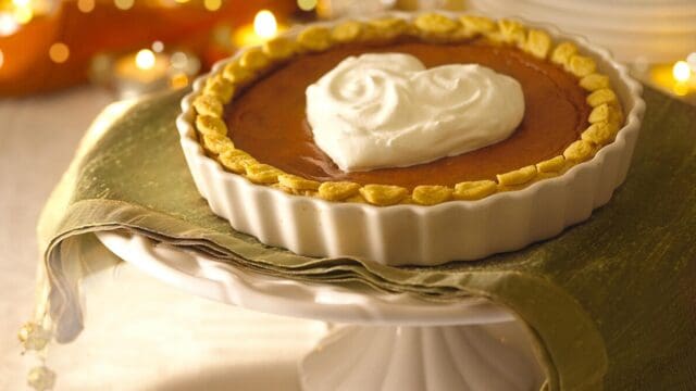 Delicious Pumpkin Tart with Whipped Cream on Ceramic Plate Tart Wallpapers