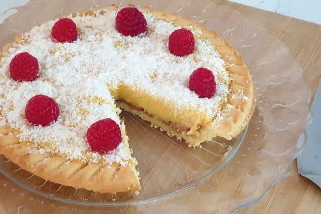 Delicious Raspberry Coconut Tart on Glass Plate Tart Wallpapers