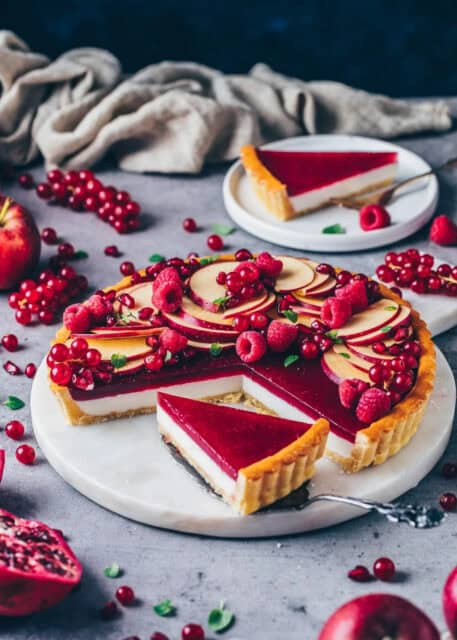 Delicious Red Berry and Apple Tart with Slice on Marble Plate by Tart Wallpapers