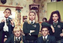 Derry Girls TV Series Wallpaper Group Photo in School Uniforms in Vintage Kitchen