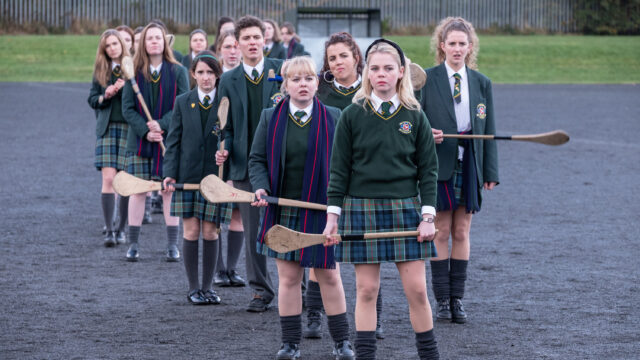 Derry Girls TV Series Wallpapers Group of Students in School Uniform Holding Hurling Sticks Outdoor