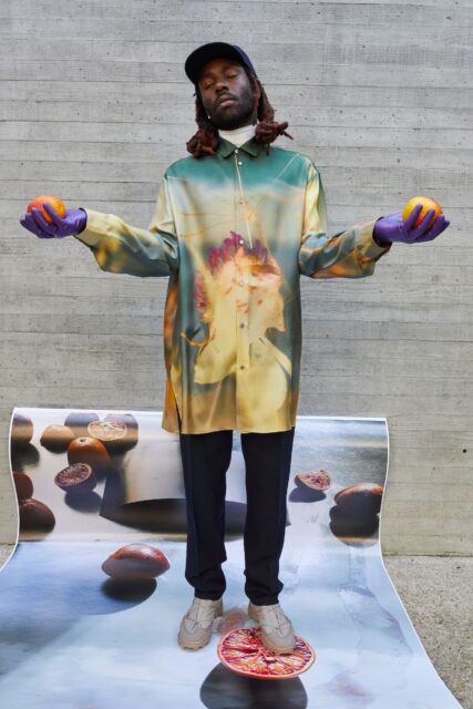Dev Hynes Aesthetic Wallpaper With Oranges And Art Shirt