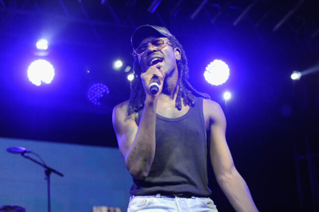 Dev Hynes Live Performance Wallpaper Captures Vibrant Stage Moment
